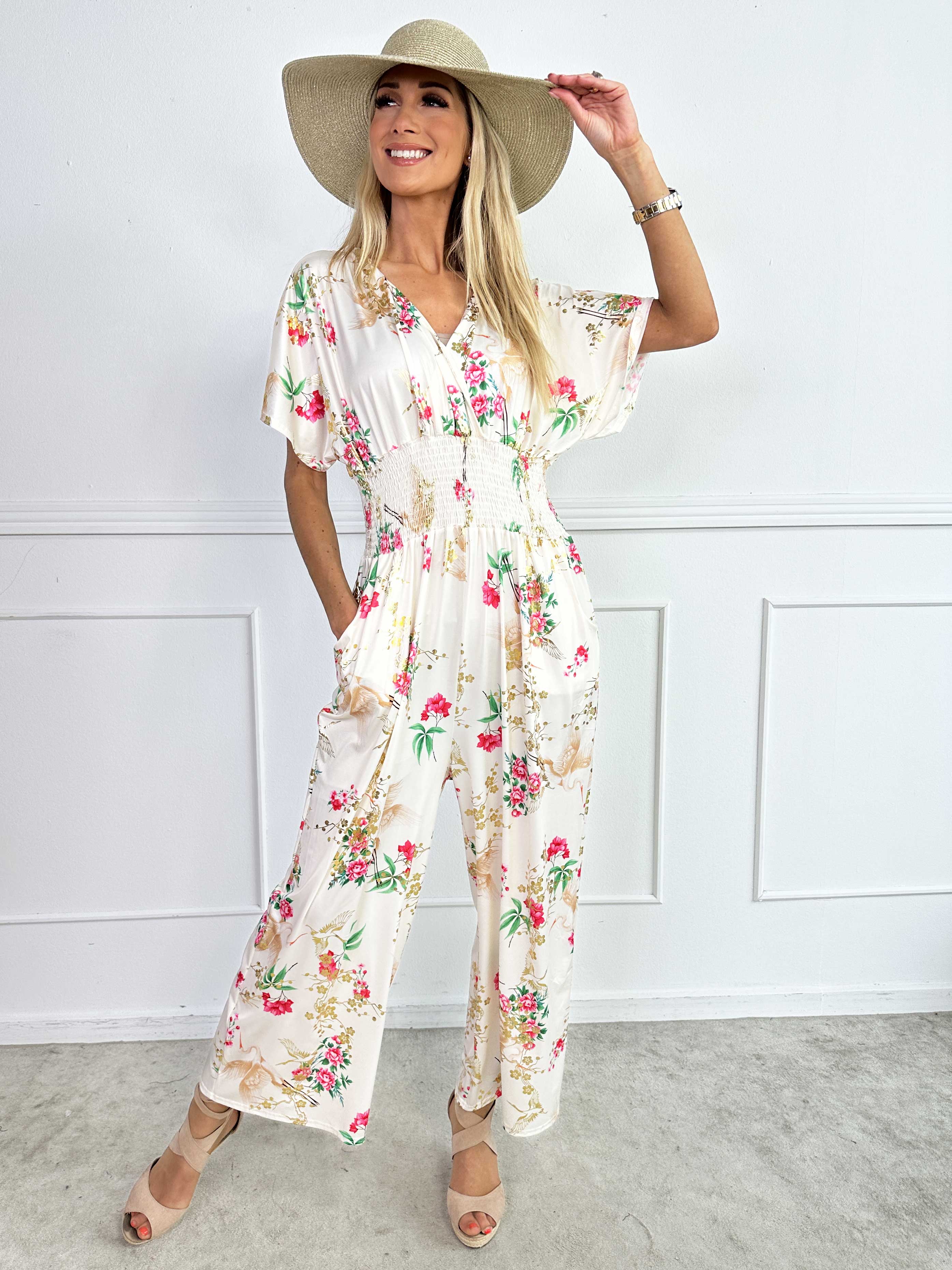 Pams Fly Jumpsuit - Elastisk buksedragt med blomster- og fugleprint